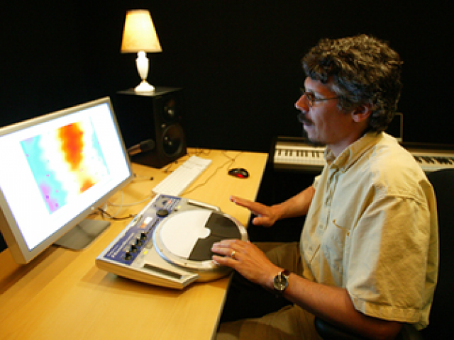 Petr Janata looks at research on his screen